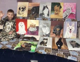 10-летний Павел Абрамов рисует кошек и собак и помогает животным